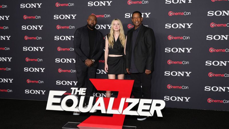 Antoine Fuqua, Dakota Fanning e Denzel Washington (Foto: Ethan Miller/Getty Images)