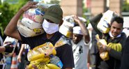 Distribuição de alimentos em Belo Horizonte (Pedro Vilela/Getty Images)