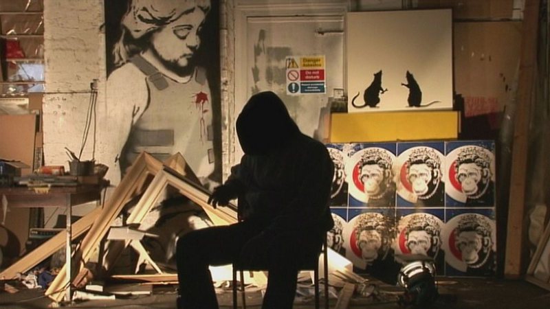 Banksy em cena de documentário (Foto: Reprodução)