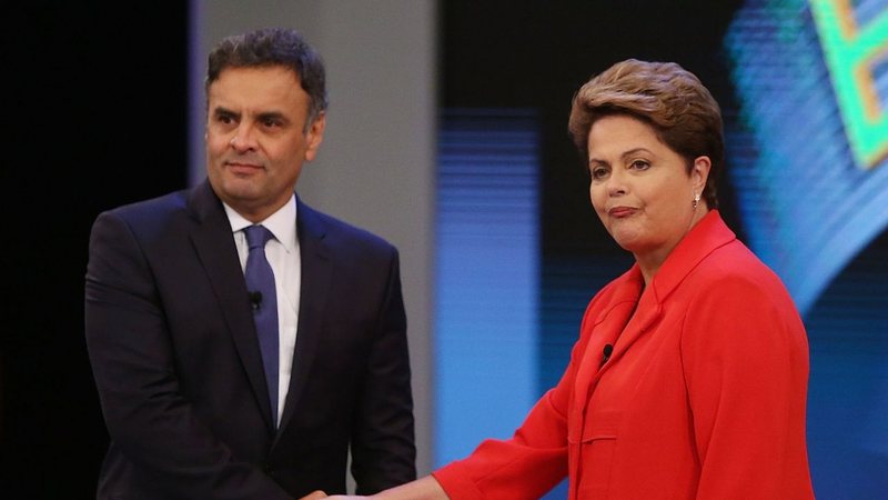 Dilma Rousseff e Aécio Neves durante disputa presidencial em 2014 (Foto:  Mario Tama/Getty Images)