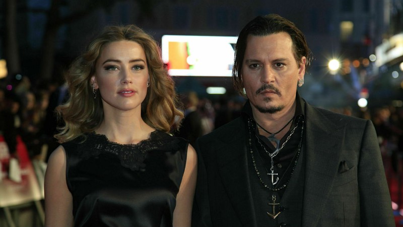 Amber Heard e Johnny Depp (Foto: Jonathan Brady/PA Wire via AP Images)