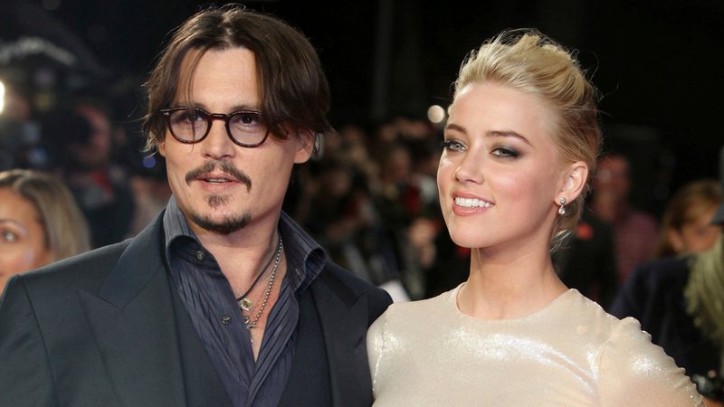 Johnny Depp e Amber Heard em 2011 (Foto: AP / Joel Ryan / File)