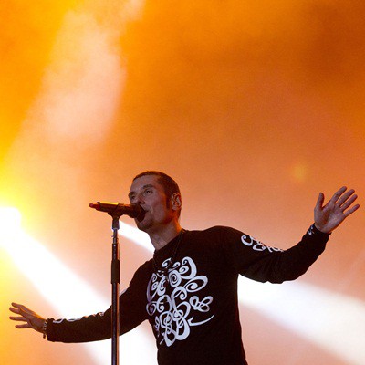 Dinho Ouro-Preto parou o show para dizer o quanto estava emocionado de tocar pela terceira vez no Rock in Rio - AP