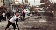 <b>MARCAS DO ÓDIO</b> Os protestos em Porto Príncipe, no Haiti, em dezembro de 2010, na época da eleição presidencial - STEFANIA MIZARA/CORBIS