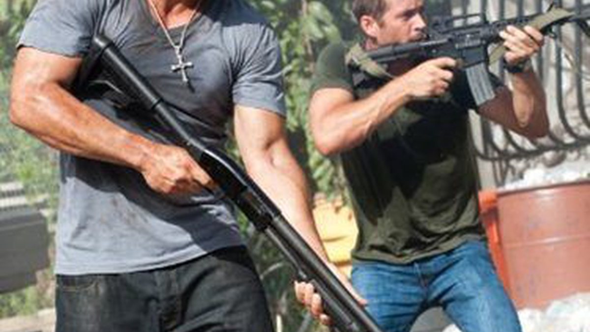 Vin Diesel e Paul Walker em cena de <i>Velozes Cinco</i> - Divulgação/Universal Pictures