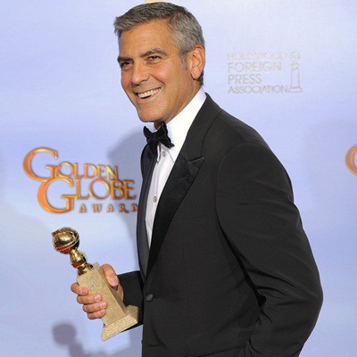 George Clooney com seu Globo de Ouro - AP