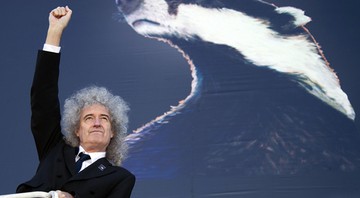 Brian May e texugo - Joel Ryan / AP