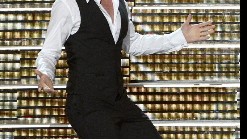 Neil Patrick Harris se apresenta durante o Emmy Awards, no Nokia Theatre, em setembro de 2013.  - Phil McCarten/AP