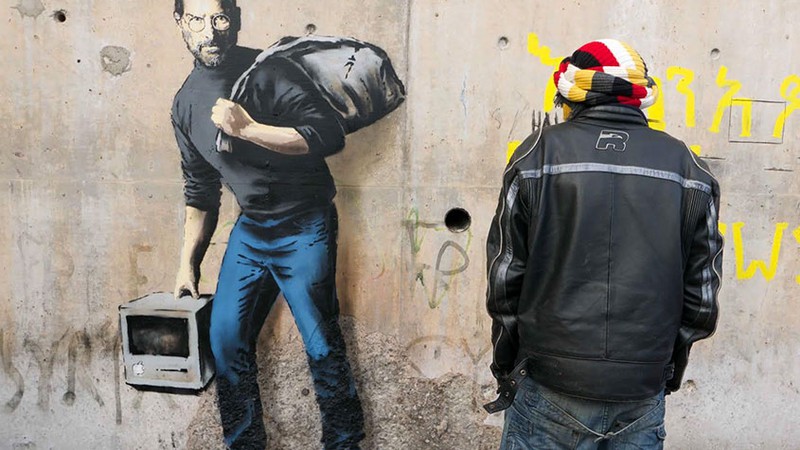 Steve Jobs retratado por Banksy como refugiado sírio - Reprodução/Site oficial