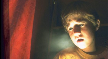 Haley Joel Osment em cena de O Sexto Sentido (Foto: Divulgação / Buena Vista)