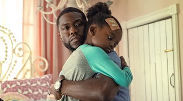 Kevin Hart e Melody Hurd abraçados em Paternidade (Foto: PHILIPPE BOSSE//Netflix)