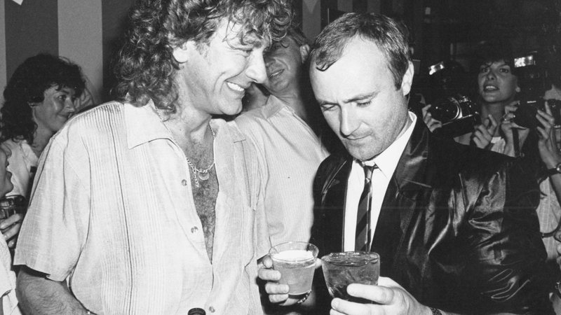 Robert Plant e Phil Collins (Foto: Gary Gershoff / MediaPunch/IPX)