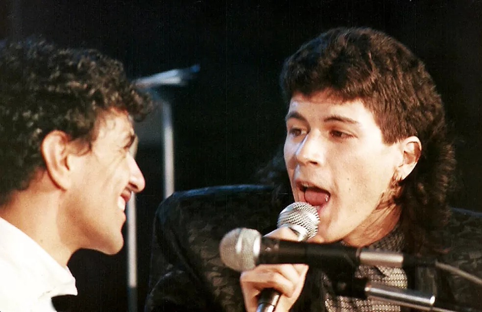 Caetano Veloso e Paulo Ricardo em um show.
