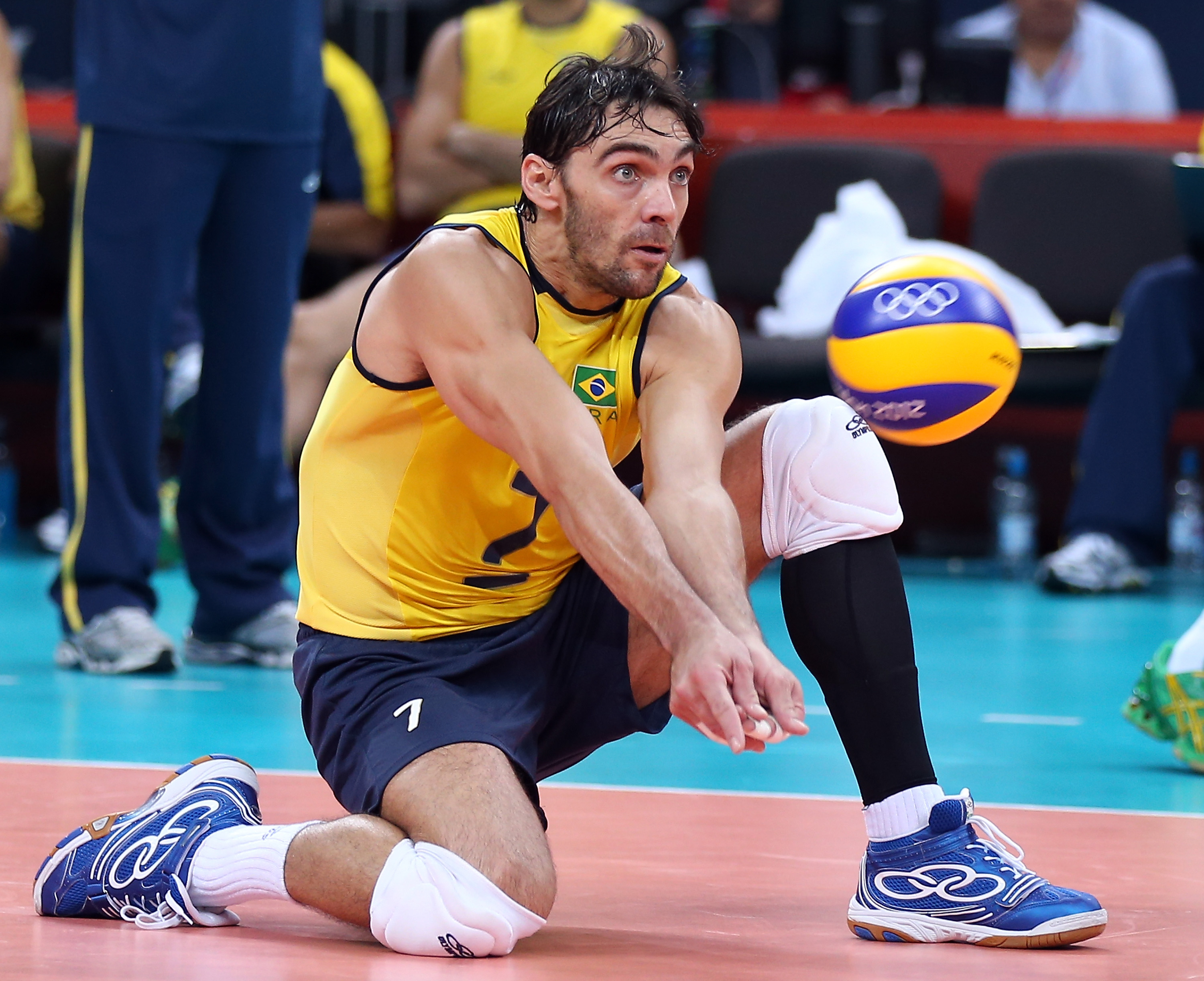 ilberto Godoy Filho #7 of Brazil returns a shot to Tunisia during Men's Volleyball on Day 2 of the London 2012 Olympic Games at Earls Court on July 29, 2012 in London, England. (Photo by Elsa/Getty Images)