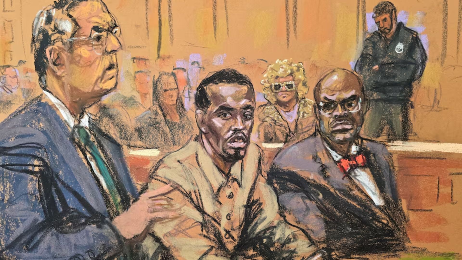 'Diddy' acompanhado pelos advogados Marc Agnifilo e Anthony Ricco, e com sua mãe sentada atrás, comparece a uma audiência no tribunal federal no bairro de Manhattan, na cidade de Nova York, EUA, em 10 de outubro de 2024