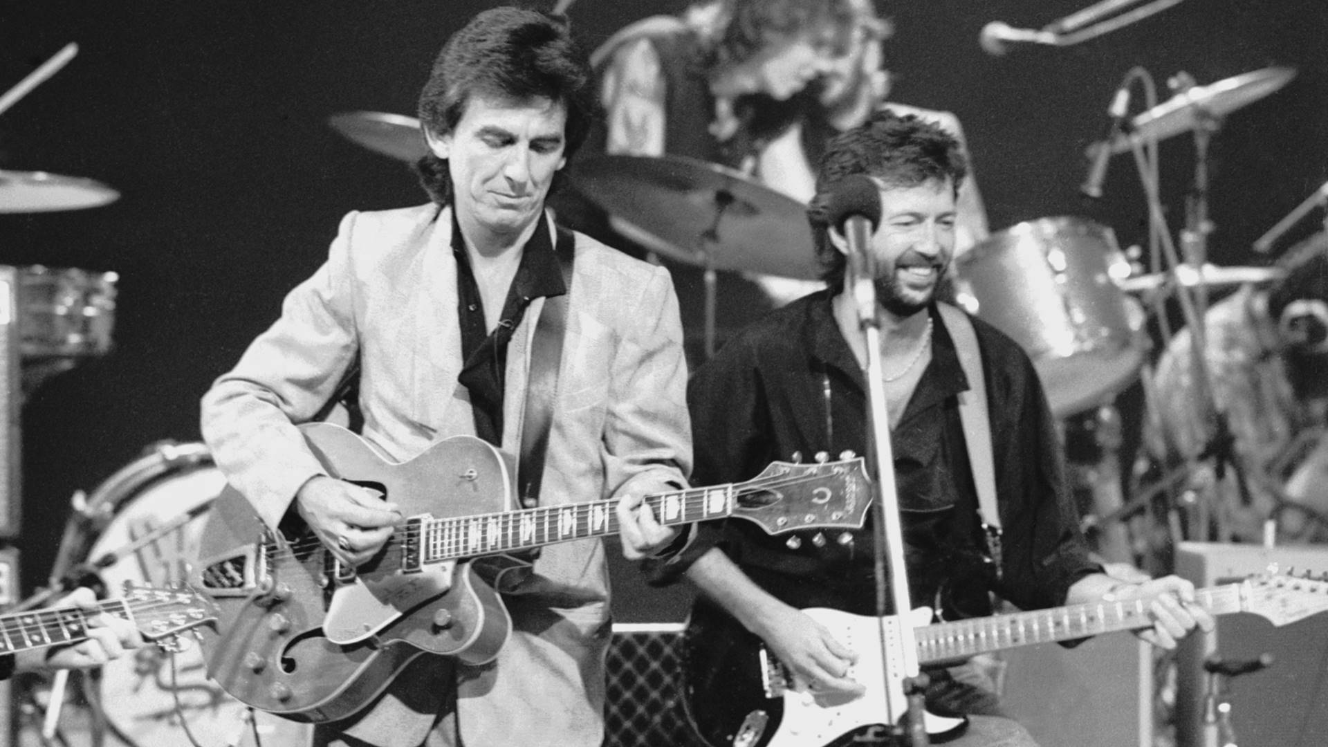 George Harrison e Eric Clapton em 1985