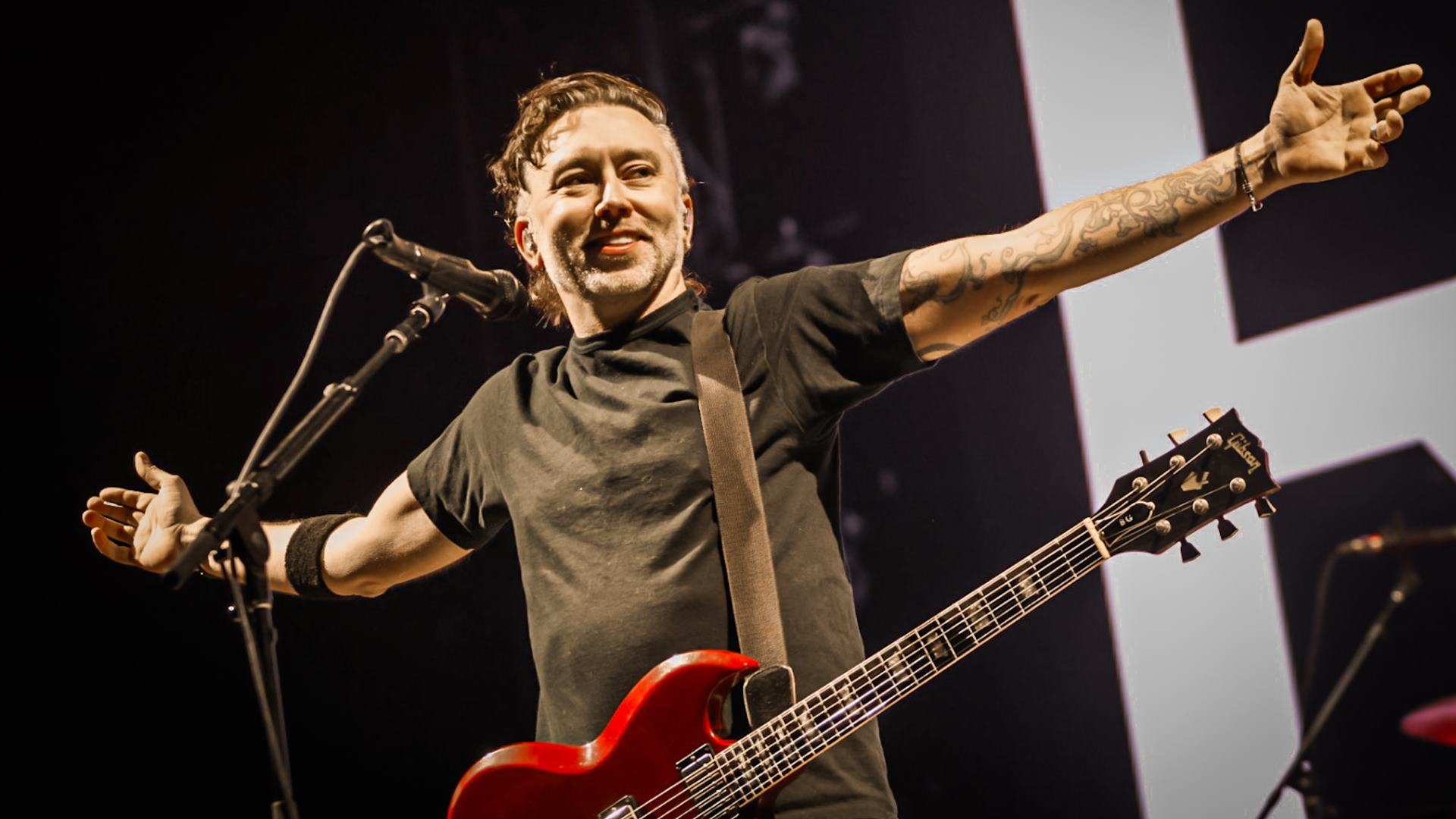 Tim McIlrath com o Rise Against no Rio