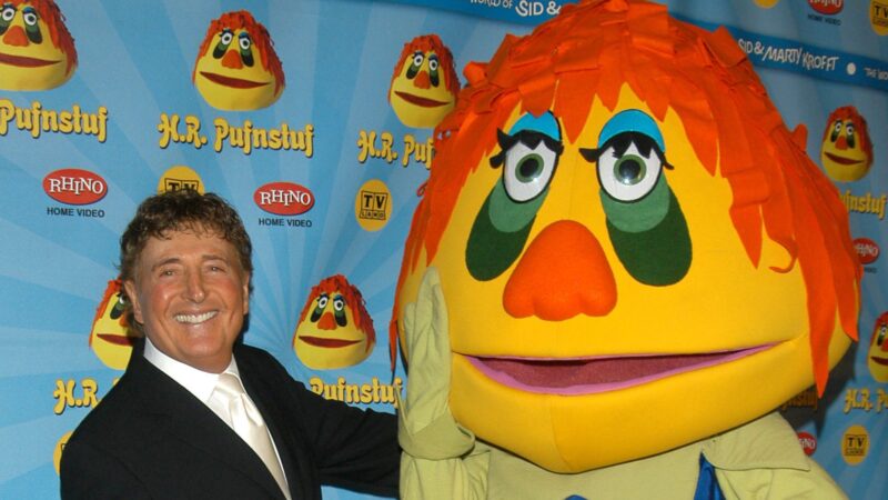 Sid Krofft e seu personagem mais famoso, H.R. Pufnstuf (Foto: Stephen Shugerman/Getty Images)