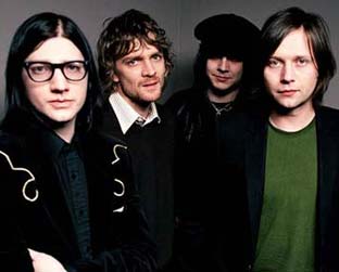 Raconteurs quer que fãs comprem álbum completo