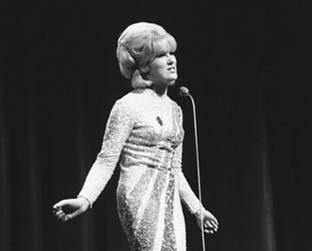 Dusty voltou às paradas com a música "What Have I Done to Deserve This?", em parceria com o Pet Shop Boys