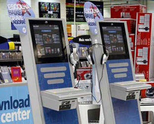 Detalhe do guichê de vendas do Download Center. Todas as lojas da rede devem ter o aparelho até 2009