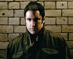 Trent Reznor mete a boca no trombone