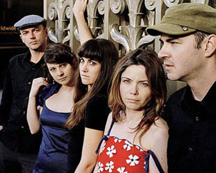 Collin (de boné verde): bossa francesa