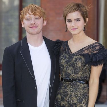 Emma Watson e Rupert Grint chegam ao hotel