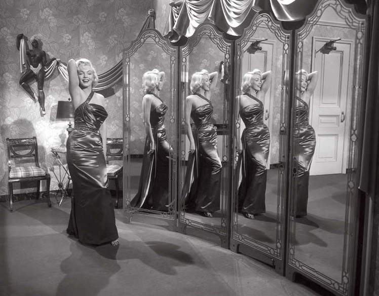 RADIANTE Marilyn em uma cena de Como Agarrar Um Milionário