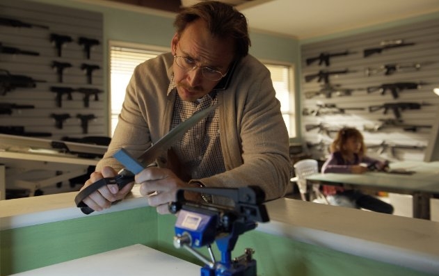 Nicolas Cage em cena do filme Kick-Ass: Quebrando Tudo