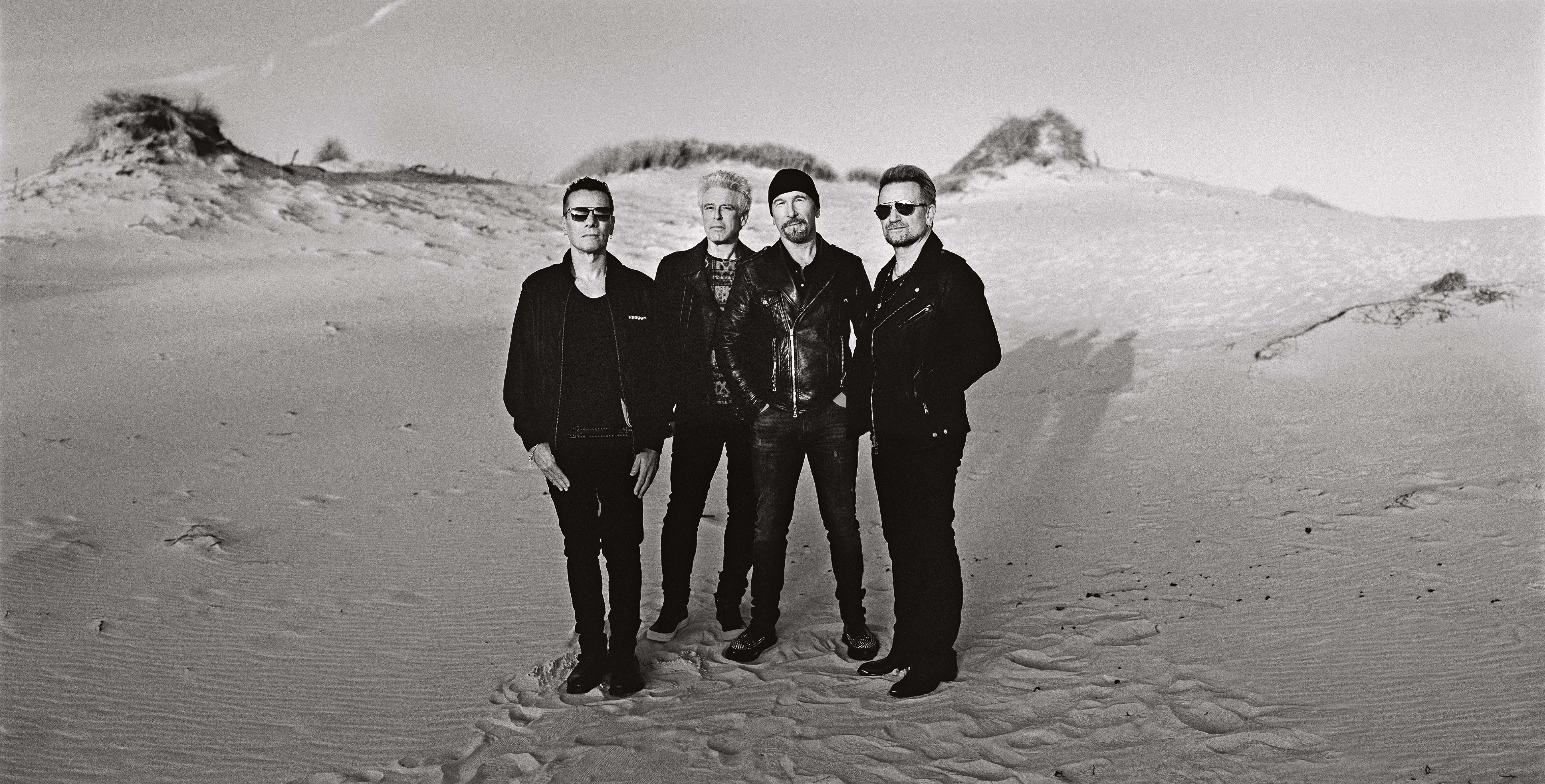 Novos Tempos  Larry Mullen Jr., Adam Clayton, The Edge e Bono