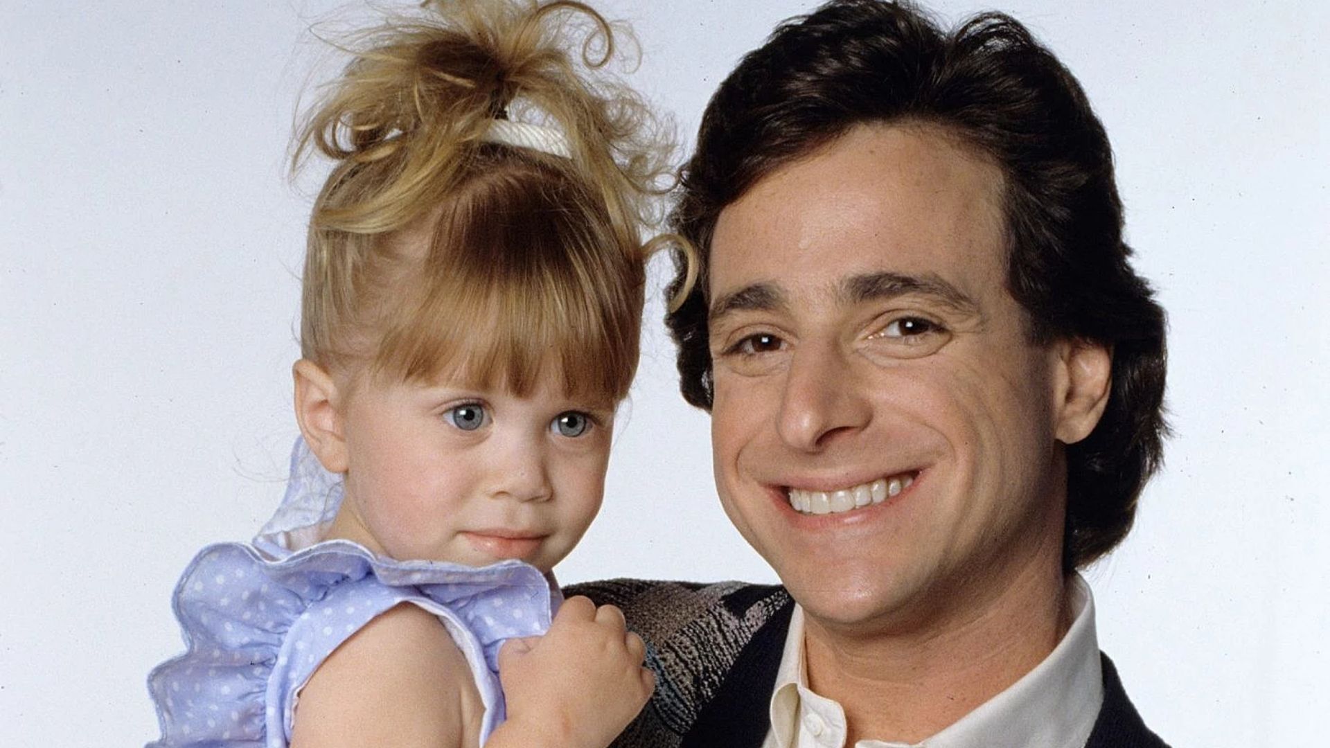 Michelle (Gêmeas Olsen) e Danny (Bob Saget) em Três é Demais (Foto: Divulgação / ABC)